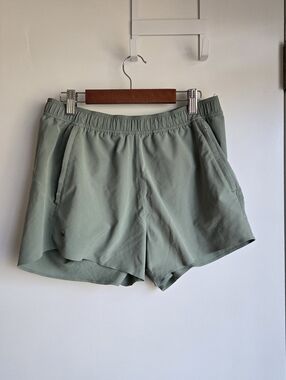 Janji Sage Green Running Shorts